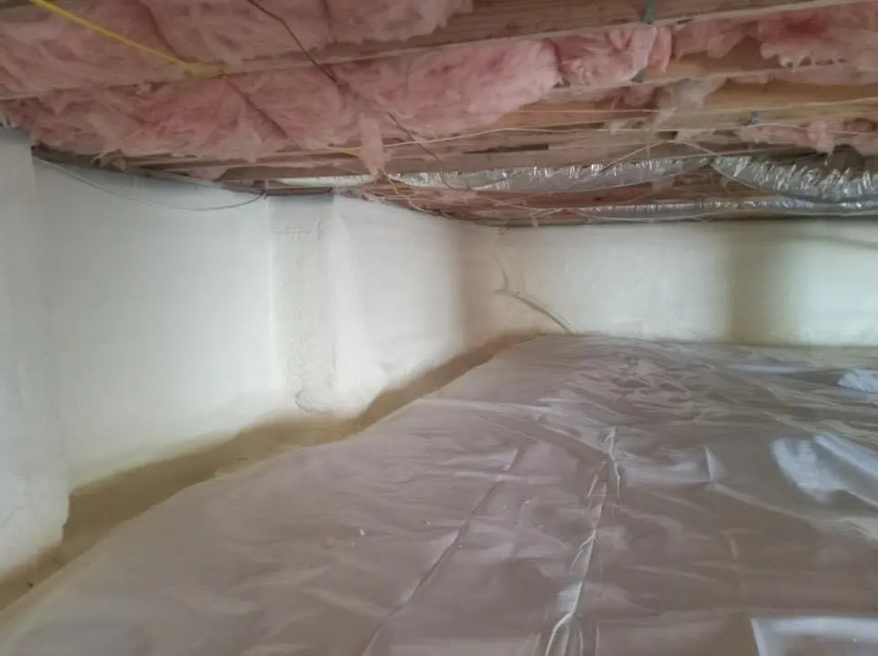 Crawl space encapsulation with closed-cell spray foam for Commercial Roof Restoration in Summerville